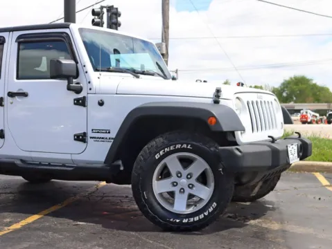 Another view of 2015 Jeep Wrangler Unlimited Sport SUV 4D for sale in Roselle, IL at Exclusive Autohaus - Roselle