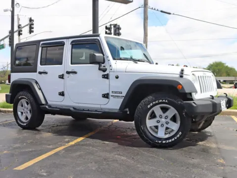 Another view of 2015 Jeep Wrangler Unlimited Sport SUV 4D for sale in Roselle, IL at Exclusive Autohaus - Roselle