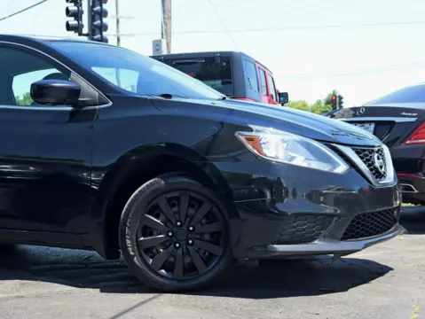 Another view of 2016 Nissan Sentra S Sedan 4D for sale in Roselle, IL at Exclusive Autohaus - Roselle