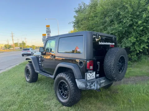 Another view of 2016 Jeep Wrangler Sport SUV 2D for sale in Roselle, IL at Exclusive Autohaus - Roselle