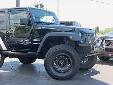 Another view of 2016 Jeep Wrangler Sport SUV 2D for sale in Roselle, IL at Exclusive Autohaus - Roselle