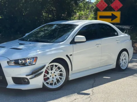 More photos of 2014 Mitsubishi Lancer Evolution GSR Sedan 4D at Exclusive Autohaus - Roselle, IL