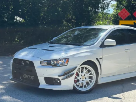 Another view of 2014 Mitsubishi Lancer Evolution GSR Sedan 4D for sale in Roselle, IL at Exclusive Autohaus - Roselle