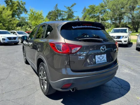 Another view of 2016 MAZDA CX-5 Grand Touring Sport Utility 4D for sale in Roselle, IL at Exclusive Autohaus - Roselle