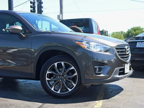 Another view of 2016 MAZDA CX-5 Grand Touring Sport Utility 4D for sale in Roselle, IL at Exclusive Autohaus - Roselle