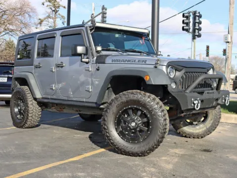Another view of 2016 Jeep Wrangler Unlimited Black Bear Sport Utility 4D for sale in Roselle, IL at Exclusive Autohaus - Roselle