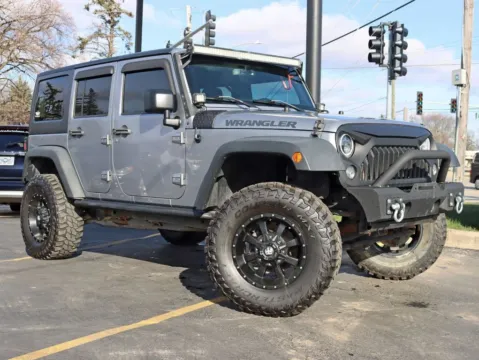Another view of 2016 Jeep Wrangler Unlimited Black Bear Sport Utility 4D for sale in Roselle, IL at Exclusive Autohaus - Roselle