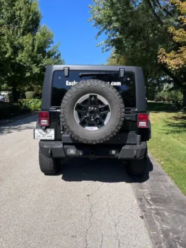More photos of 2016 Jeep Wrangler Unlimited Black Bear Sport Utility 4D at Exclusive Autohaus - Roselle, IL