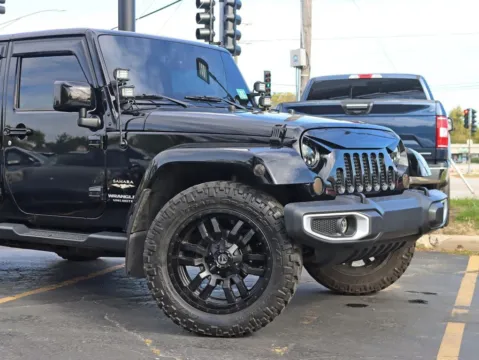 Another view of 2015 Jeep Wrangler Unlimited Sahara Sport Utility 4D for sale in Roselle, IL at Exclusive Autohaus - Roselle