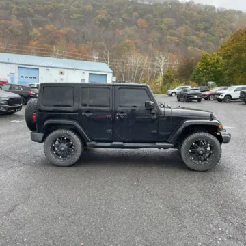 More photos of 2014 Jeep Wrangler Unlimited Altitude Sport Utility 4D at Exclusive Autohaus - Roselle, IL