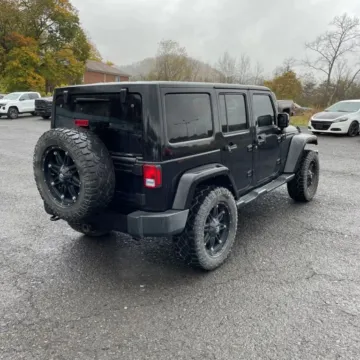 Photos of 2014 Jeep Wrangler Unlimited Altitude Sport Utility 4D for sale in Roselle, IL at Exclusive Autohaus - Roselle
