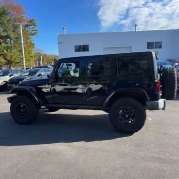 Photos of 2015 Jeep Wrangler Unlimited Rubicon Sport Utility 4D for sale in Roselle, IL at Exclusive Autohaus - Roselle
