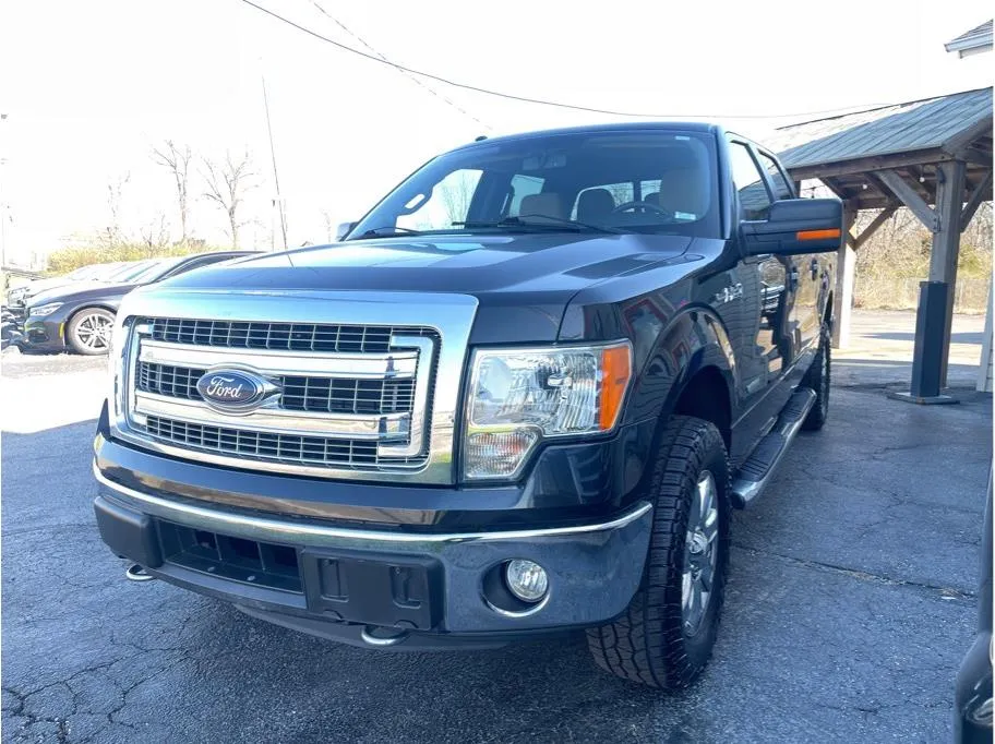 Black 2014 Ford F-150 SuperCrew Cab XLT Pickup 4D 5 1/2 ft for sale in O’Fallon, MO