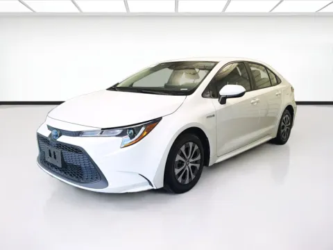 White 2021 Toyota Corolla Hybrid LE for sale in Montclair, CA