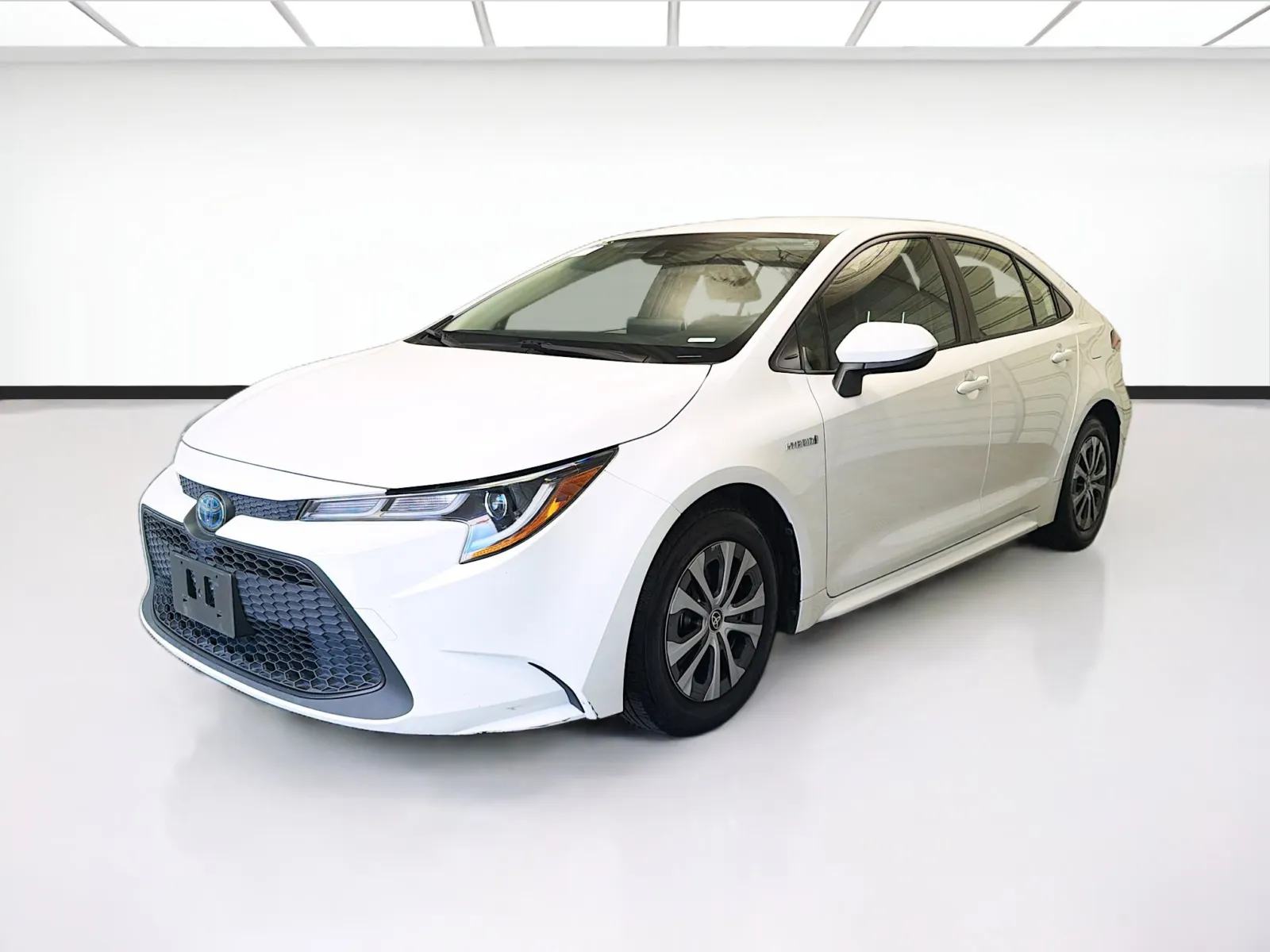White 2021 Toyota Corolla Hybrid LE for sale in Montclair, CA