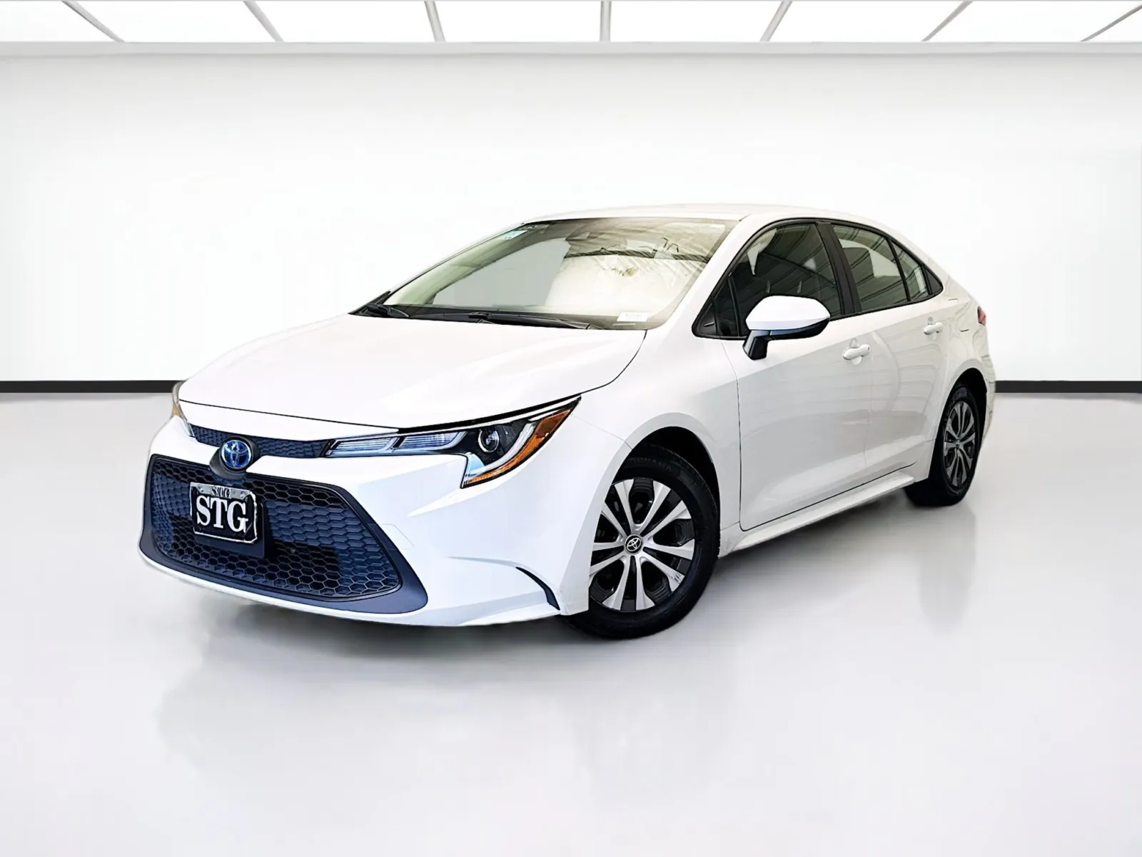 White 2022 Toyota Corolla Hybrid LE for sale in Montclair, CA