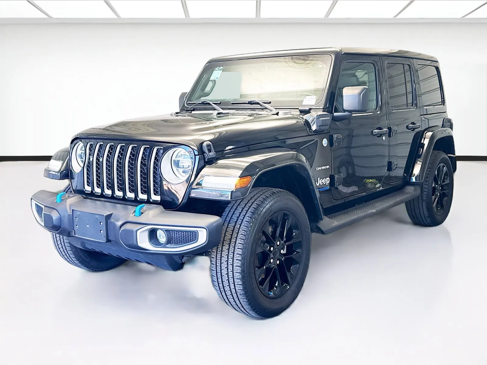Black 2022 Jeep Wrangler Unlimited Sahara 4xe Sky One Touch Power Top for sale in Montclair, CA