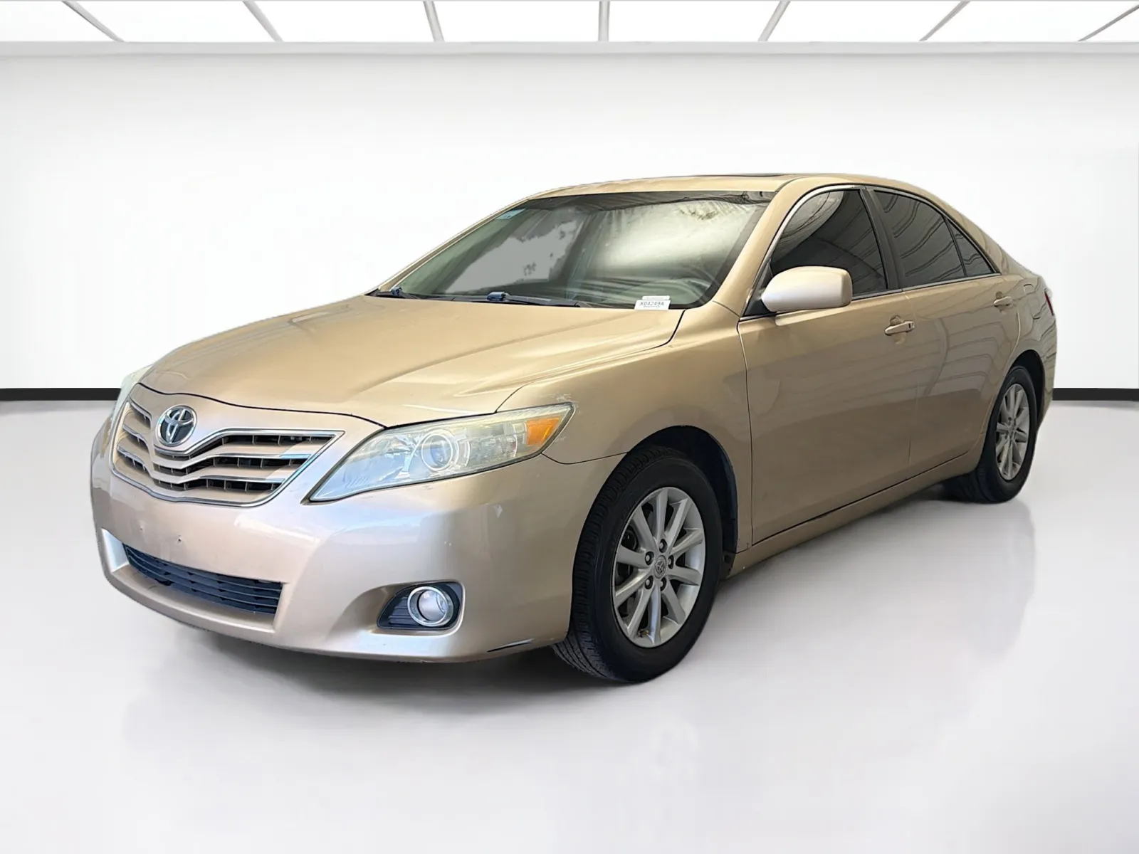 Beige 2010 Toyota Camry XLE for sale in Montclair, CA