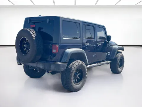 More photos of 2013 Jeep Wrangler Unlimited Sport at KarGenie, CA