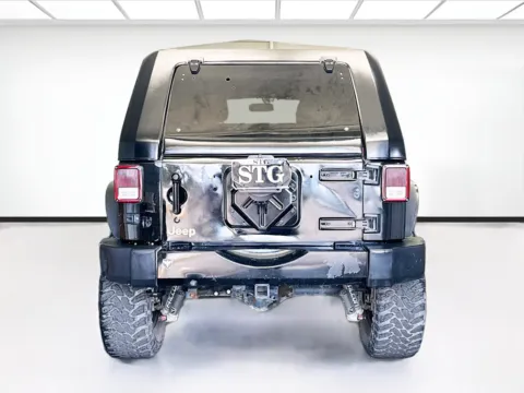 More photos of 2014 Jeep Wrangler Unlimited Unlimited Sahara Dragon Edition at KarGenie, CA