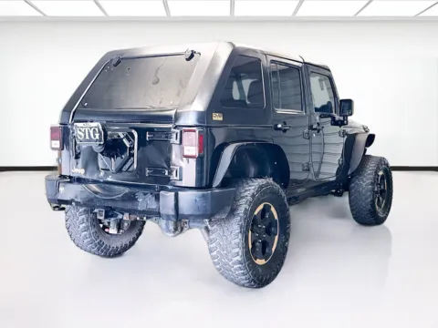 More photos of 2014 Jeep Wrangler Unlimited Unlimited Sahara Dragon Edition at KarGenie, CA