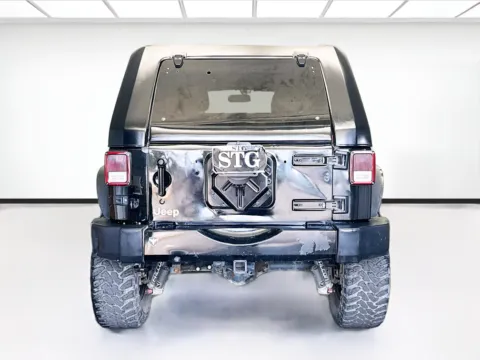 More photos of 2014 Jeep Wrangler Unlimited Unlimited Sahara Dragon Edition at KarGenie, CA