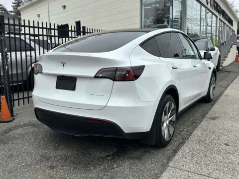 Another view of 2023 Tesla Model Y Long Range for sale in Great Neck, NY at Certified Luxury Motors - Great Neck