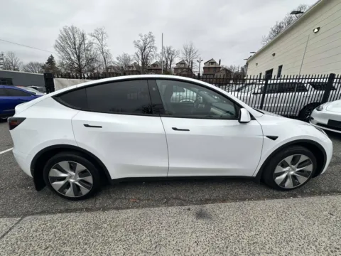 Photos of 2023 Tesla Model Y Long Range for sale in Great Neck, NY at Certified Luxury Motors - Great Neck
