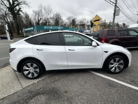 Photos of 2022 Tesla Model Y Long Range for sale in Great Neck, NY at Certified Luxury Motors - Great Neck