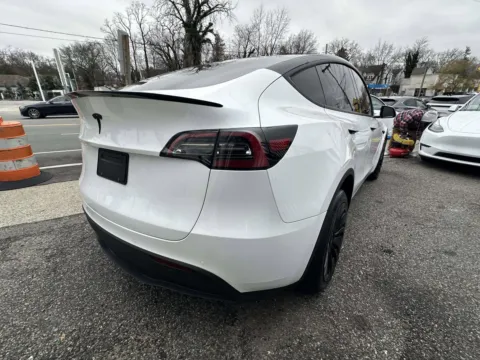 Another view of 2022 Tesla Model Y Long Range for sale in Great Neck, NY at Certified Luxury Motors - Great Neck