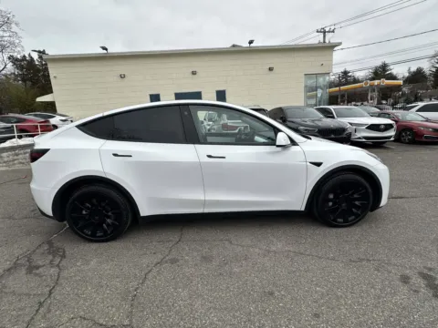 Photos of 2021 Tesla Model Y Long Range (White Interior) for sale in Great Neck, NY at Certified Luxury Motors - Great Neck