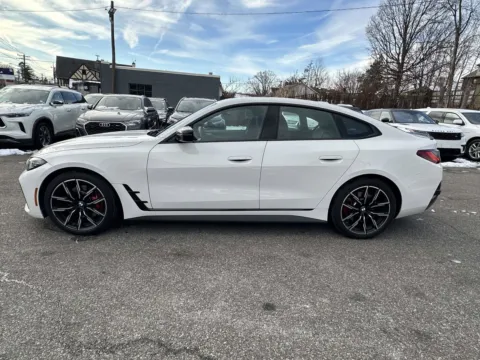 More photos of 2023 BMW 4 Series 430i xDrive (Red Interior) at Certified Luxury Motors - Great Neck, NY