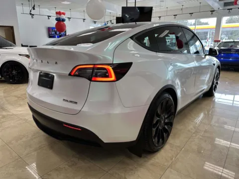 Photos of 2022 Tesla Model Y Performance for sale in Great Neck, NY at Certified Luxury Motors - Great Neck