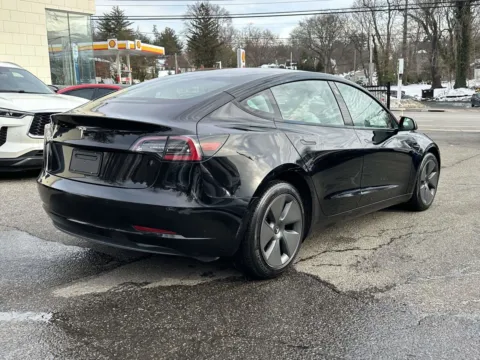 Another view of 2021 Tesla Model 3 Standard Range Plus (White Interior) for sale in Great Neck, NY at Certified Luxury Motors - Great Neck