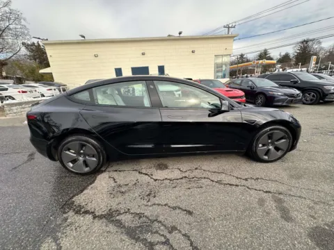 Photos of 2021 Tesla Model 3 Standard Range Plus (White Interior) for sale in Great Neck, NY at Certified Luxury Motors - Great Neck