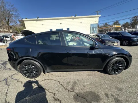 Another view of 2021 Tesla Model Y Long Range for sale in Great Neck, NY at Certified Luxury Motors - Great Neck