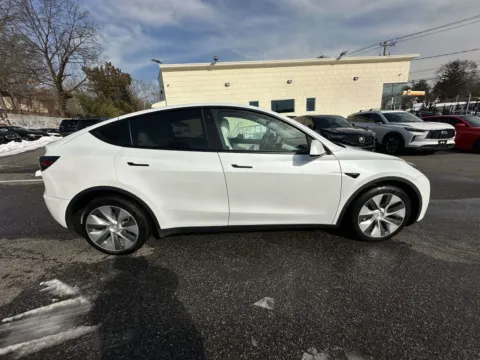 Photos of 2021 Tesla Model Y Long Range (White Interior) for sale in Great Neck, NY at Certified Luxury Motors - Great Neck