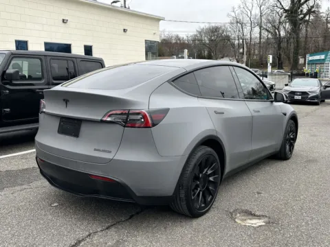 Another view of 2022 Tesla Model Y Long Range (White Interior) for sale in Great Neck, NY at Certified Luxury Motors - Great Neck