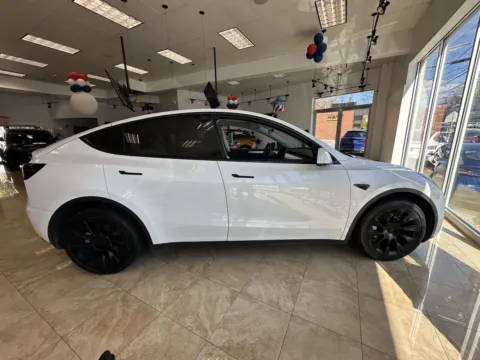 Photos of 2023 Tesla Model Y Long Range (White Interior) for sale in Great Neck, NY at Certified Luxury Motors - Great Neck