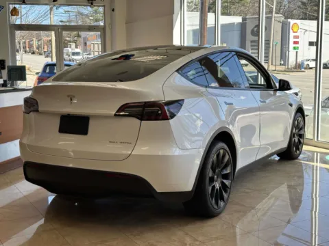 Another view of 2023 Tesla Model Y Long Range (White Interior) for sale in Great Neck, NY at Certified Luxury Motors - Great Neck