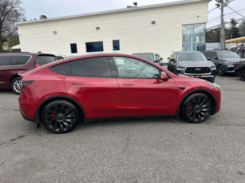 Photos of 2022 Tesla Model Y Performance (Only 16k Miles!) for sale in Great Neck, NY at Certified Luxury Motors - Great Neck