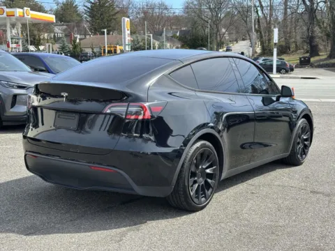 Another view of 2021 Tesla Model Y Long Range for sale in Great Neck, NY at Certified Luxury Motors - Great Neck