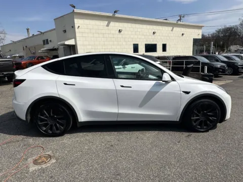 Photos of 2021 Tesla Model Y Long Range (White Interior) for sale in Great Neck, NY at Certified Luxury Motors - Great Neck