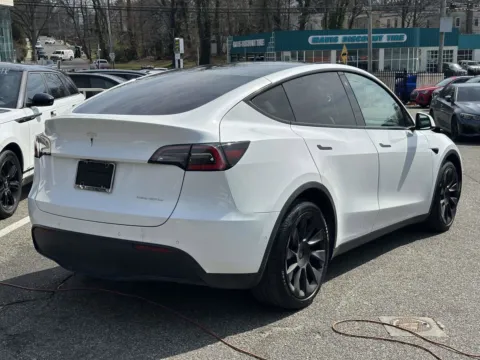 Another view of 2021 Tesla Model Y Long Range (White Interior) for sale in Great Neck, NY at Certified Luxury Motors - Great Neck