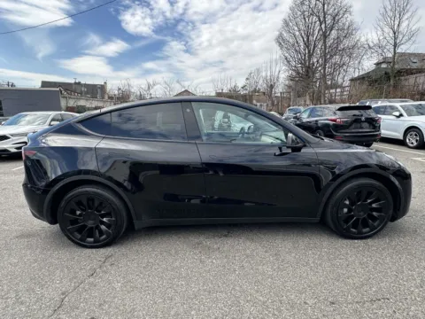 Photos of 2023 Tesla Model Y Long Range for sale in Great Neck, NY at Certified Luxury Motors - Great Neck