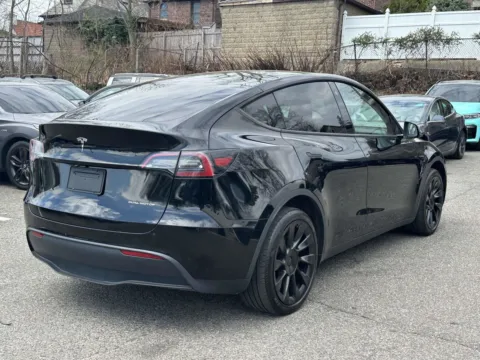 Another view of 2023 Tesla Model Y Long Range for sale in Great Neck, NY at Certified Luxury Motors - Great Neck