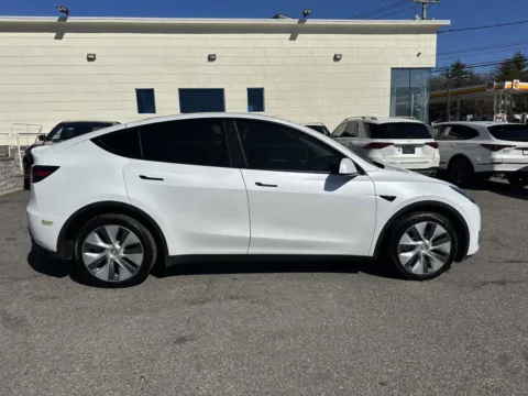 Photos of 2023 Tesla Model Y Long Range for sale in Great Neck, NY at Certified Luxury Motors - Great Neck