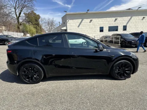 Photos of 2023 Tesla Model Y Long Range for sale in Great Neck, NY at Certified Luxury Motors - Great Neck