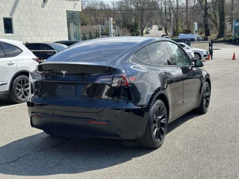 Another view of 2023 Tesla Model Y Long Range for sale in Great Neck, NY at Certified Luxury Motors - Great Neck