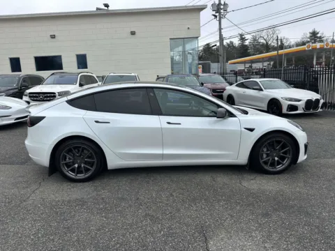 Photos of 2021 Tesla Model 3 Standard Range Plus for sale in Great Neck, NY at Certified Luxury Motors - Great Neck